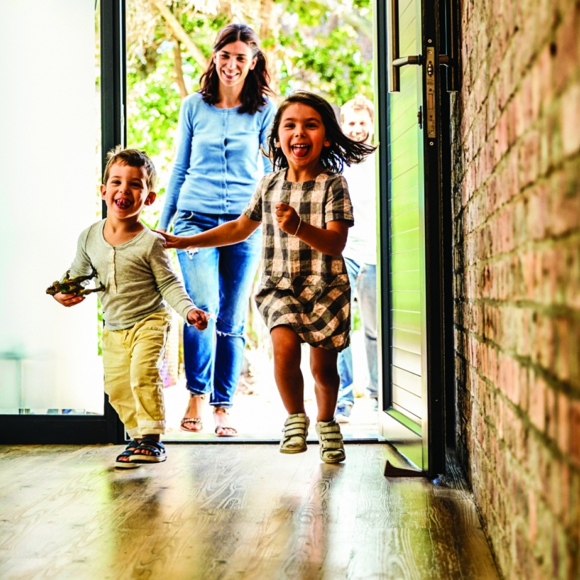 children running happily through the front door 
