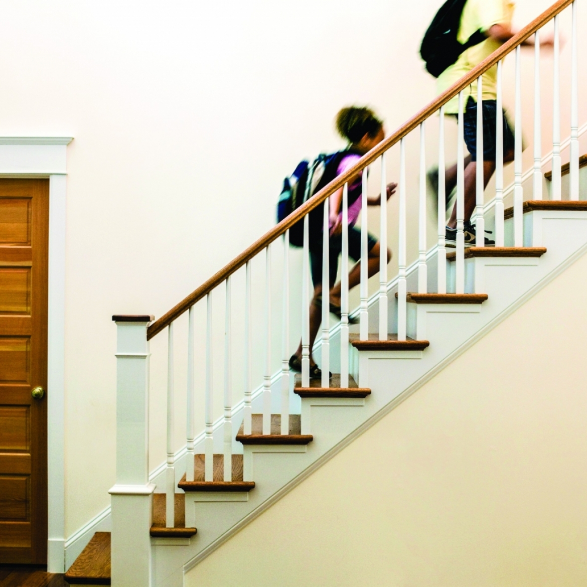 children running up a set of stairs